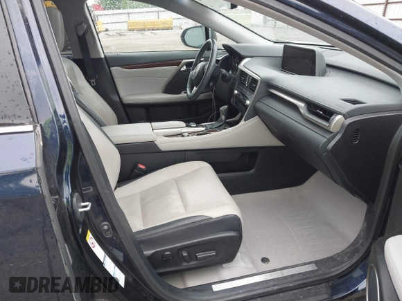 2016 Lexus RX 350 with VIN 2T2BZMCA1GC012079, listed as a IAAI auction lot 42265304 with 124,861 mi miles and . Bid and sale history available at DreamBid. Image 5.
