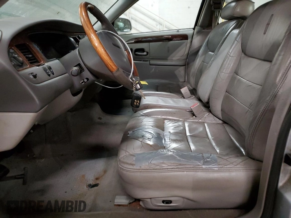 2002 Lincoln Town Car Signature z VIN 1LNHM82W02Y665486, wystawiony jako Copart lot #41381275 z przebiegiem Nie podano mil oraz Szkoda całkowita • Salvage title. Historia ofert i sprzedaży dostępna na DreamBid. Obrazek 7.