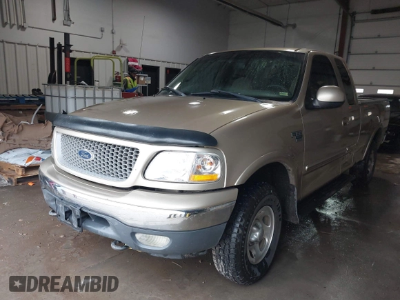 1999 Ford F-150 with VIN 1FTRX18W0XKA68363, listed as a IAAI auction lot 41524104 with 218,400 mi miles and . Bid and sale history available at DreamBid. Image 18.