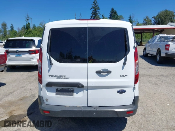 2018 Ford Transit Connect XLT z VIN NM0LS7F71J1372251, wystawiony jako IAAI lot #42630651 z przebiegiem 75 072 mil mil oraz . Historia ofert i sprzedaży dostępna na DreamBid. Obrazek 17.