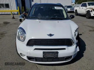 2014 MINI Countryman S with VIN WMWZC3C5XEWP25792, listed as a Copart auction lot 58583455 with 83,831 mi miles and Salvage title. Bid and sale history available at DreamBid. Image 5.