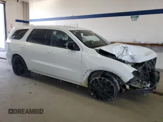 2015 Dodge Durango R/T with VIN 1C4SDJCT3FC801585, listed as a Copart auction lot 50305035 with 138,304 mi miles and Salvage Title. Bid and sale history available at carsss.com. Image 4.