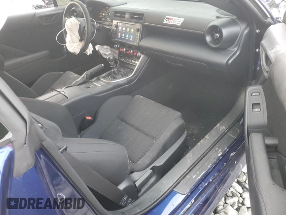 2024 Toyota 86 with VIN JF1ZNBB19R9756189, listed as a Copart auction lot 86570014 with 5,417 mi miles and Salvage Title. Bid and sale history available at DreamBid. Image 8.