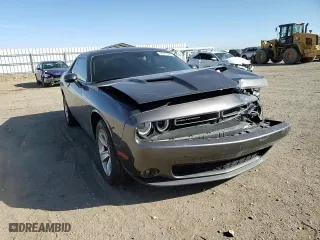 2021 Dodge Challenger SXT with VIN 2C3CDZAG1MH623506, listed as a Copart auction lot 44610625 with 66,837 mi miles and Salvage Title. Bid and sale history available at carsss.com. Image 11.