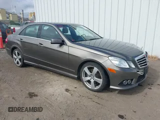 2010 Mercedes-Benz E with VIN WDDHF5GB2AA115447, listed as a IAAI auction lot 42068721 with 133,081 mi miles. Bid and sale history available at carsss.com. Image 1.