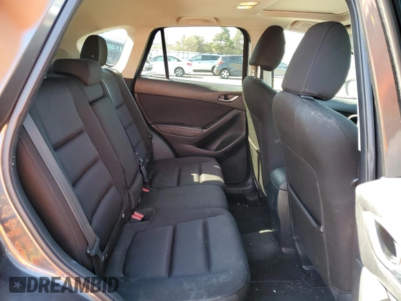 2014 Mazda CX-5 Touring with VIN JM3KE2CY7E0366690, listed as a Copart auction lot 50783635 with 127,853 mi miles and Salvage Title. Bid and sale history available at carsss.com. Image 11.