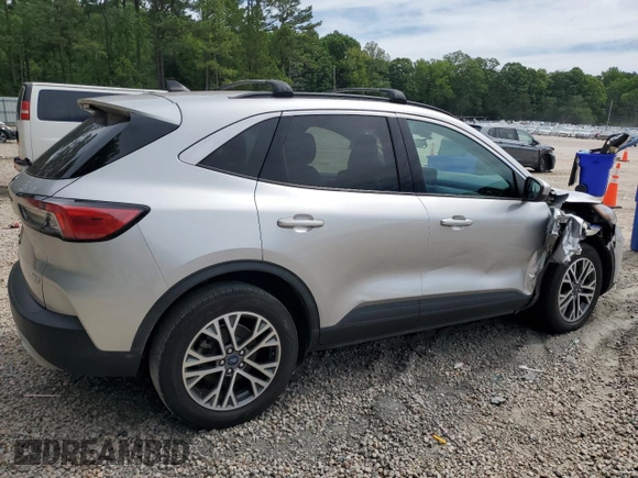 2020 Ford Escape SEL z VIN 1FMCU9H66LUB44403, wystawiony jako Copart lot #57934925 z przebiegiem Nie podano mil oraz Szkoda całkowita • Salvage title. Historia ofert i sprzedaży dostępna na DreamBid. Obrazek 3.