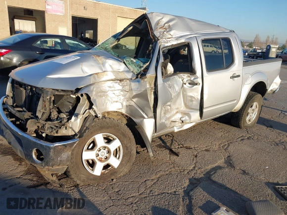 2006 Nissan Frontier SE z VIN 1N6AD07W66C470766, wystawiony jako IAAI lot #41023377 z przebiegiem Nie podano mil oraz . Historia ofert i sprzedaży dostępna na DreamBid. Obrazek 2.