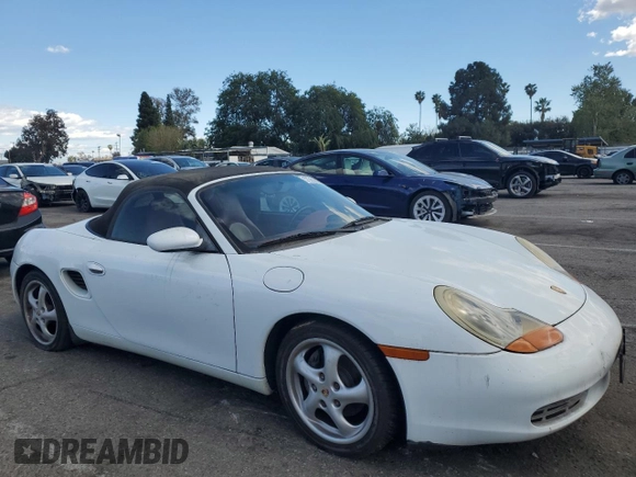 1999 Porsche Boxster z VIN WP0CA2984XU629987, wystawiony jako Copart lot #51366845 z przebiegiem Nie podano mil oraz Czysty tytuł • Clean title. Historia ofert i sprzedaży dostępna na DreamBid. Obrazek 4.