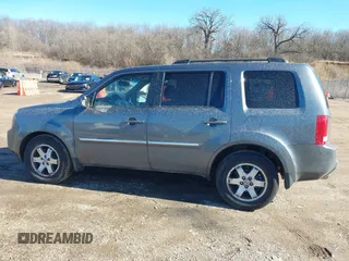 2010 Honda Pilot Touring with VIN 5FNYF4H93AB008589, listed as a IAAI auction lot 41731084 with 138,554 mi miles and . Bid and sale history available at carsss.com. Image 14.