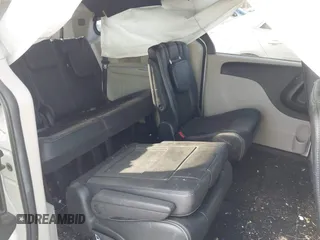 2019 Dodge Grand Caravan SXT with VIN 2C4RDGCG4KR771745, listed as a IAAI auction lot 41859267 with 97,436 mi miles and . Bid and sale history available at DreamBid. Image 8.
