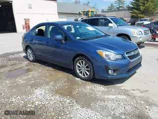 2012 Subaru Impreza Sedan 2.0i Premium with VIN JF1GJAC63CH020482, listed as a IAAI auction lot 42051003 with 169,070 mi miles. Bid and sale history available at carsss.com. Image 1.