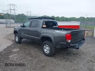 2017 Toyota Tacoma SR5 with VIN 3TMCZ5ANXHM089093, listed as a IAAI auction lot 42513711 with 86,022 mi miles and . Bid and sale history available at DreamBid. Image 3.