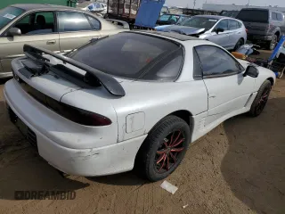 1992 Mitsubishi 3000GT z VIN JA3XE74C1NY066108, wystawiony jako Copart lot #75669024 z przebiegiem 177 762 mil mil oraz Nie do naprawy. Historia ofert i sprzedaży dostępna na DreamBid. Obrazek 3.