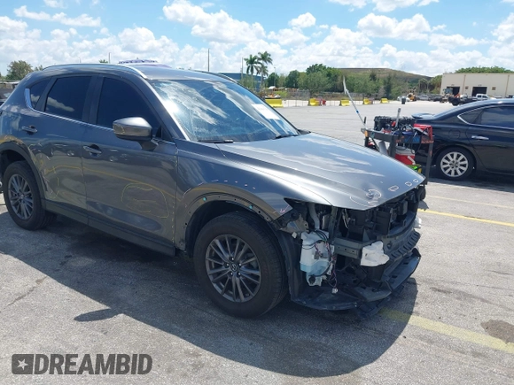 2020 Mazda CX-5 Touring with VIN JM3KFACM9L0826742, listed as a IAAI auction lot 41903755 with 73,409 mi miles and . Bid and sale history available at DreamBid. Image 1.