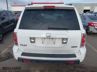 2006 Honda Pilot EX-L with VIN 2HKYF18576H517590, listed as a IAAI auction lot 41802601 with 233,833 mi miles. Bid and sale history available at carsss.com. Image 16.