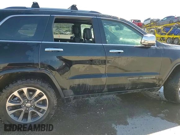 2017 Jeep Grand Cherokee Overland with VIN 1C4RJFCTXHC778491, listed as a Copart auction lot 73944594 with 99,235 mi miles and Clean Title. Bid and sale history available at carsss.com. Image 14.
