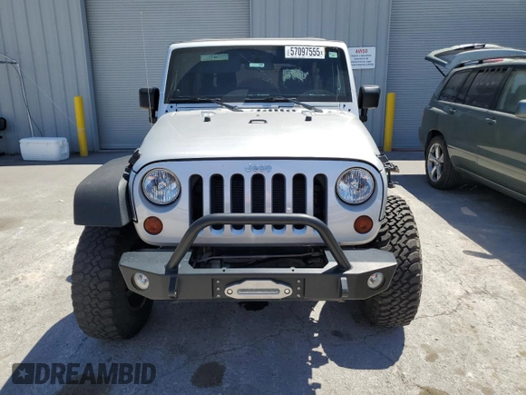 2012 Jeep Wrangler Unlimited Call of Duty MW3 with VIN 1C4BJWFG9CL199551, listed as a Copart auction lot 57097555 with 43,651 mi miles and Salvage title. Bid and sale history available at DreamBid. Image 5.