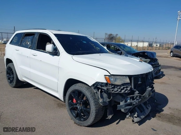 2015 Jeep Grand Cherokee SRT with VIN 1C4RJFDJ4FC122071, listed as a IAAI auction lot 41455849 with 251,476 mi miles. Bid and sale history available at carsss.com. Image 1.