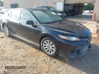 2019 Toyota Camry LE z VIN 4T1B11HK2KU711823, wystawiony jako IAAI lot #42281421 z przebiegiem 76 817 mil mil oraz . Historia ofert i sprzedaży dostępna na DreamBid. Obrazek 1.