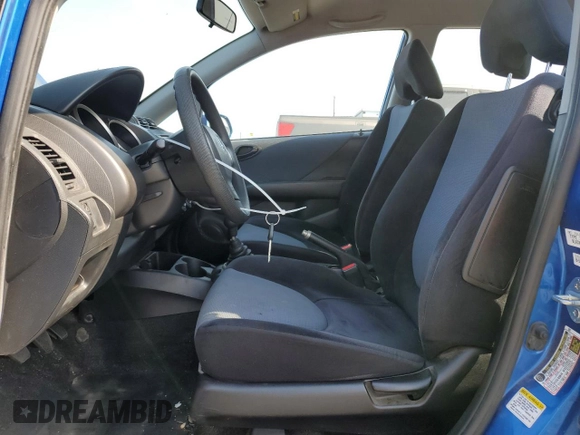 2007 Honda Fit with VIN JHMGD37407S044719, listed as a Copart auction lot 59192715 with 275,955 mi miles and Clean title. Bid and sale history available at DreamBid. Image 7.