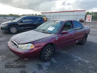 1999 Ford Contour SE z VIN 1FAFP6635XK169090, wystawiony jako IAAI lot #42198696 z przebiegiem 114 933 mil mil oraz . Historia ofert i sprzedaży dostępna na DreamBid. Obrazek 17.