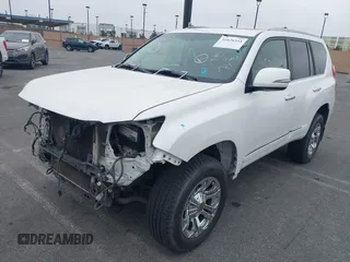 2013 Lexus GX 460 with VIN JTJBM7FX4D5064140, listed as a IAAI auction lot 41626551 with 147,028 mi miles and . Bid and sale history available at DreamBid. Image 2.
