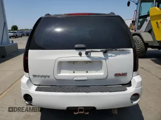 2006 GMC Envoy SLE z VIN 1GKDT13S762345183, wystawiony jako Copart lot #60096645 z przebiegiem 249 658 mil mil oraz Szkoda całkowita • Salvage title. Historia ofert i sprzedaży dostępna na DreamBid. Obrazek 6.