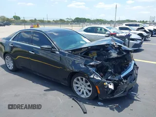 2016 Cadillac CTS RWD z VIN 1G6AP5SX2G0168176, wystawiony jako IAAI lot #42277088 z przebiegiem 88 730 mil mil oraz . Historia ofert i sprzedaży dostępna na DreamBid. Obrazek 1.