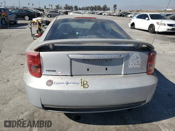 2003 Toyota Celica GT with VIN JTDDR32T130164099, listed as a Copart auction lot 77907374 with 73,950 mi miles and Salvage Title. Bid and sale history available at carsss.com. Image 6.