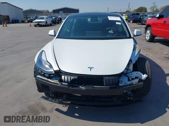 2023 Tesla Model 3 with VIN 5YJ3E1EA9PF585632, listed as a IAAI auction lot 40520993 with 7,775 mi miles and . Bid and sale history available at DreamBid. Image 13.