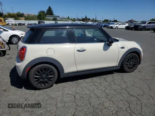 2019 MINI Hardtop Cooper z VIN WMWXP5C52K2H29767, wystawiony jako Copart lot #61006445 z przebiegiem 50 212 mil mil oraz Szkoda całkowita • Salvage title. Historia ofert i sprzedaży dostępna na DreamBid. Obrazek 3.
