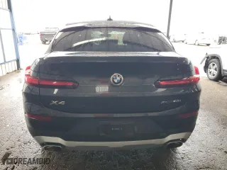 2024 BMW X4 xDrive30i with VIN 5UX33DT04R9U84057, listed as a Copart auction lot 53869955 with 28,263 mi miles and Clean Title. Bid and sale history available at carsss.com. Image 6.