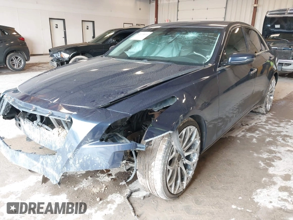 2015 Cadillac CTS AWD z VIN 1G6AW5SXXF0136481, wystawiony jako IAAI lot #42173024 z przebiegiem 128 984 mil mil oraz . Historia ofert i sprzedaży dostępna na DreamBid. Obrazek 18.