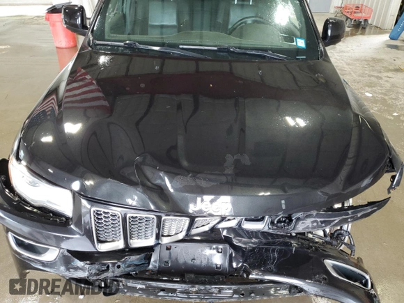 2015 Jeep Grand Cherokee Summit with VIN 1C4RJFJG0FC685241, listed as a Copart auction lot 56122505 with 112,516 mi miles and Salvage title. Bid and sale history available at DreamBid. Image 12.