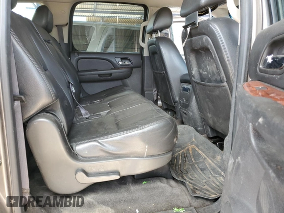 2013 GMC Yukon XL SLT with VIN 1GKS1KE09DR305240, listed as a Copart auction lot 53143565 with 210,872 mi miles and Salvage Title. Bid and sale history available at DreamBid. Image 11.