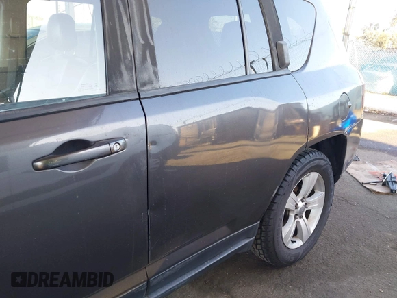 2016 Jeep Compass Latitude with VIN 1C4NJDEB2GD685383, listed as a IAAI auction lot 41968450 with 273,938 mi miles. Bid and sale history available at carsss.com. Image 6.