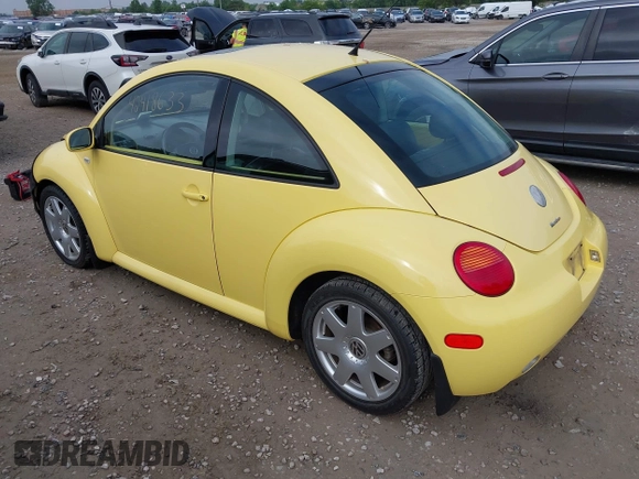 2003 Volkswagen Beetle GLX z VIN 3VWDD21C83M428634, wystawiony jako IAAI lot #42418633 z przebiegiem 188 472 mil mil oraz . Historia ofert i sprzedaży dostępna na DreamBid. Obrazek 3.