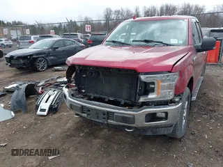 2018 Ford F-150 XL z VIN 1FTFX1E5XJFB66587, wystawiony jako IAAI lot #41870713 z przebiegiem 72 991 mil mil oraz . Historia ofert i sprzedaży dostępna na DreamBid. Obrazek 22.