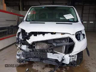 2023 Ford Transit Cargo with VIN 1FTBR1Y87PKA20405, listed as a IAAI auction lot 41907508 with 26,846 mi miles and . Bid and sale history available at DreamBid. Image 13.