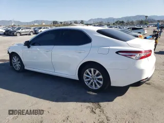 2020 Toyota Camry LE with VIN 4T1C11AK5LU944417, listed as a Copart auction lot 47455145 with 52,562 mi miles and Salvage Title. Bid and sale history available at DreamBid. Image 2.