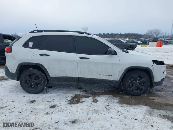 2016 Jeep Cherokee Altitude with VIN 1C4PJLAB4GW376723, listed as a IAAI auction lot 41593248 with 96,940 mi miles. Bid and sale history available at carsss.com. Image 13.