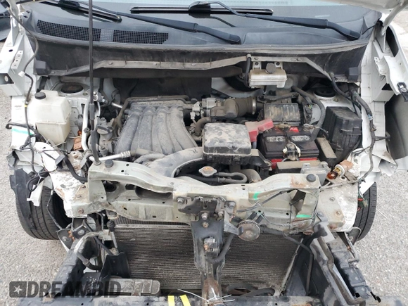 2014 Nissan NV200 SV with VIN 3N6CM0KN9EK699328, listed as a Copart auction lot 86809024 with 77,678 mi miles and Salvage title. Bid and sale history available at DreamBid. Image 12.