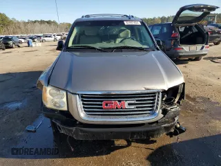 2009 GMC Envoy SLE with VIN 1GKDS33SX92131159, listed as a Copart auction lot 82487404 with 224,391 mi miles and Salvage Title. Bid and sale history available at carsss.com. Image 5.