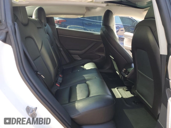 2020 Tesla Model 3 Standard Range Plus with VIN 5YJ3E1EA6LF661513, listed as a Copart auction lot 47008985 with 128,362 mi miles and Non Repairable. Bid and sale history available at DreamBid. Image 10.