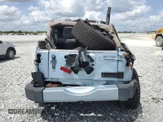 2012 Jeep Wrangler Unlimited Sahara with VIN 1C4BJWEG8CL174402, listed as a Copart auction lot 51831805 with Not provided miles and Non repairable. Bid and sale history available at DreamBid. Image 6.