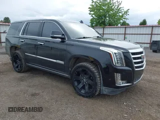 2017 Cadillac Escalade Premium Luxury z VIN 1GYS4CKJ0HR271498, wystawiony jako IAAI lot #42349511 z przebiegiem 52 338 mil mil oraz . Historia ofert i sprzedaży dostępna na DreamBid. Obrazek 1.
