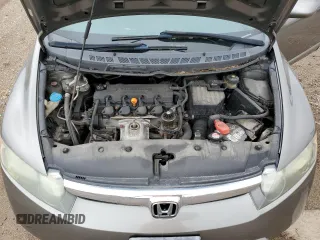 2006 Honda Civic LX z VIN 1HGFA16586L132710, wystawiony jako Copart lot #55261865 z przebiegiem 143 679 mil mil oraz Szkoda całkowita • Salvage title. Historia ofert i sprzedaży dostępna na DreamBid. Obrazek 11.