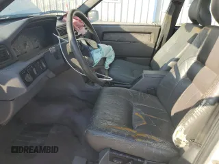 1994 Volvo 900 z VIN YV1JS8611R1172830, wystawiony jako Copart lot #75955284 z przebiegiem 222 846 mil mil oraz Szkody całkowita. Historia ofert i sprzedaży dostępna na DreamBid. Obrazek 7.