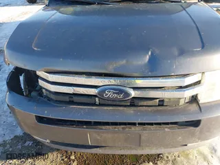 2009 Ford Flex Limited with VIN 2FMEK63C89BA73679, listed as a IAAI auction lot 41322466 with 229,814 mi miles. Bid and sale history available at carsss.com. Image 6.